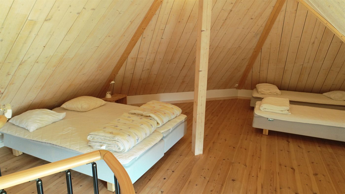 Sovrum med dubbelsäng i Lägenhet 3